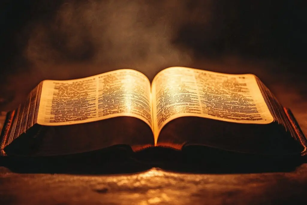 An open Bible perfectly balanced, with a precise light on its middle verse, showing the exact center