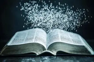 An open Bible with countless small numbers (verses) flowing to a large total number, representing the sum of all verses