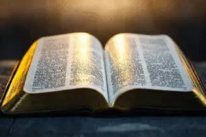 Open Gospel text with Jesus' words highlighted, symbolizing his teachings on the Bible