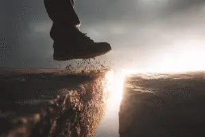 A bridge of light appearing under a persons step a metaphor for what is faith in the Bible