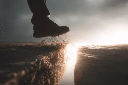 A bridge of light appearing under a persons step a metaphor for what is faith in the Bible