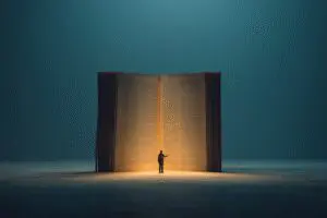A person acknowledging their record in a ledger representing what the Bible says about accountability