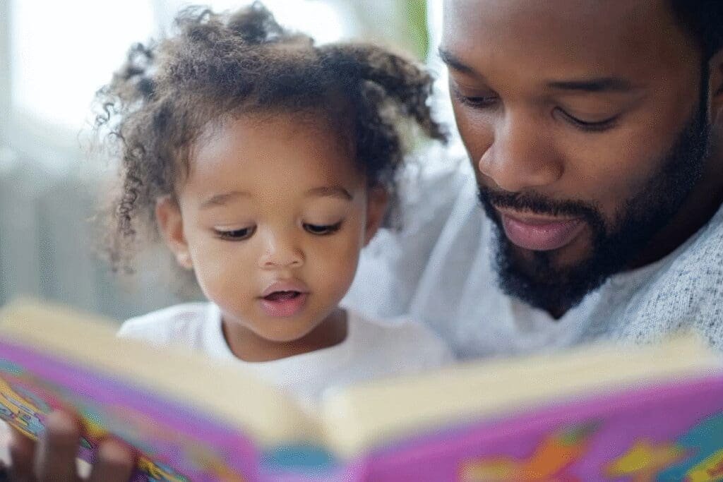 A parent and child reading a brightly illustrated children's Bible, guiding parents on best versions for kids.